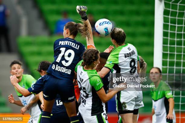 Margot Robinne of Canberra United heads the ball away from defensive goal during the round 14 A-League Women's match between Melbourne Victory and...