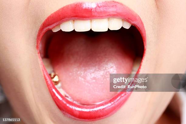 young woman shouting - capped tooth imagens e fotografias de stock