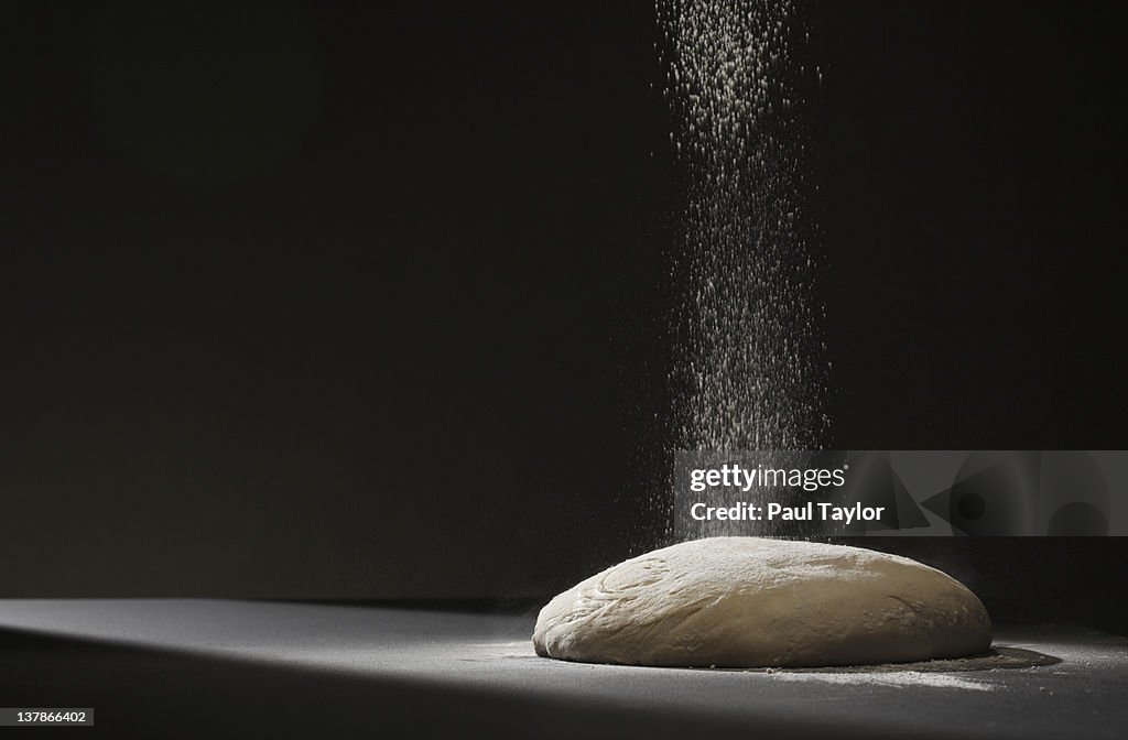 Flour Falling on Dough