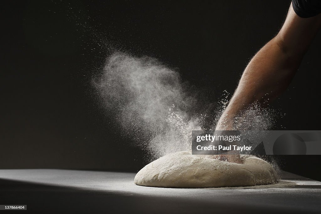 Fist Punching Down Dough