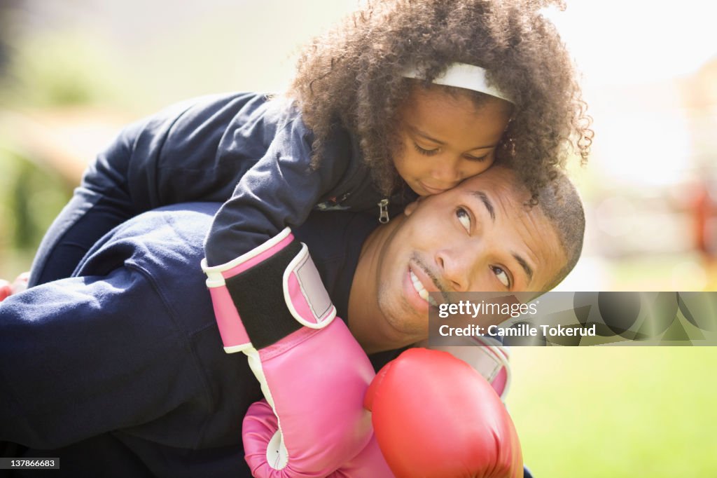 Daughter hugging father