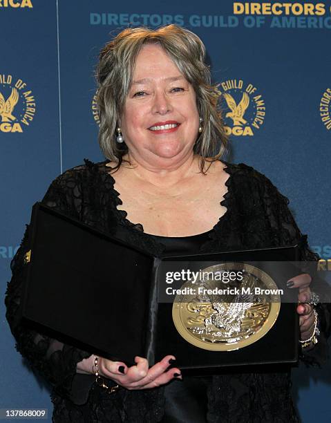 Presenter Kathy Bates, accepting the Feature Film Nomination Plaque for 'Midnight In Paris' on behalf of Woody Allen, poses in the press room at the...