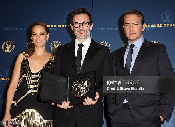 Actress Berenice Bejo, director Michel Hazanavicius and actor Jean Dujardin pose in the press room during the 64th Annual Directors Guild Of America...