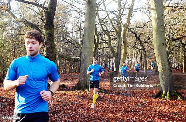 multiple exposure of male athlete running running. - double effort stock pictures, royalty-free photos & images