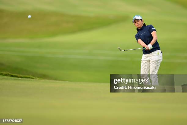 Shinobu Moromizato of Japan chips onto the 9th green during the second round of the Daikin Orchid Ladies at Ryukyu Golf Club on March 4, 2022 in...