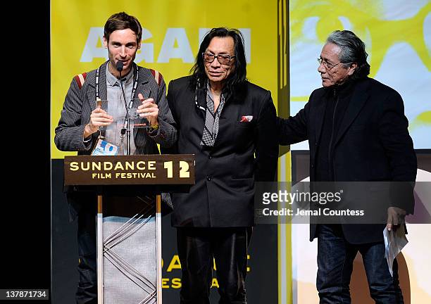 Director Malik Bendjelloul and musician Rodriguez accept The World Cinema Audience Award: Documentary for "Searching for Sugar Man" presented by...
