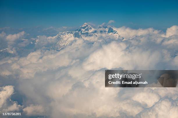 himalayan mountains, view from the flight from kathmandu to tibet, china - machapuchare stock pictures, royalty-free photos & images