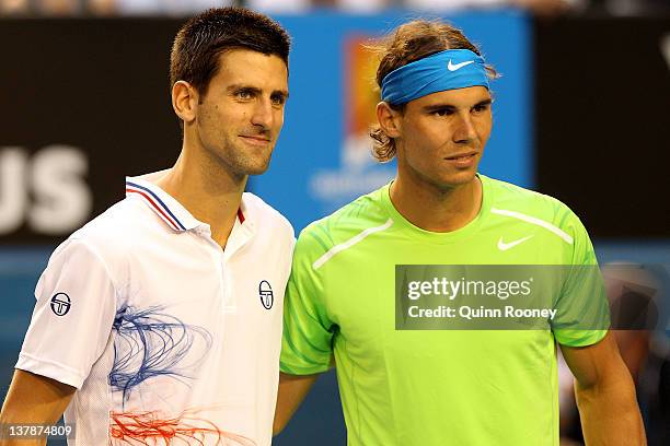 Novak Djokovic of Serbia and Rafael Nadal of Spain pose prior to their men's final match during day fourteen of the 2012 Australian Open at Melbourne...