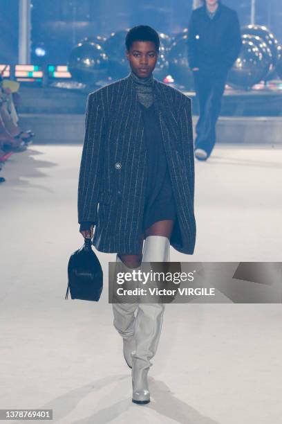 Model walks the runway during the Isabel Marant Womenswear Fall/Winter 2022-2023 fashion show as part of Paris Fashion Week on March 03, 2022 in...