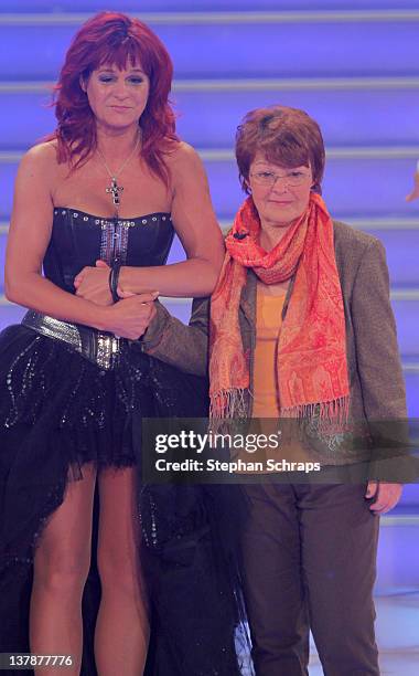 Singer Andrea Berg receives congratulations to her 45th birthday from her mother, Helga Zellen , during the MDR 'Winterfest der fliegenden Stars' at...