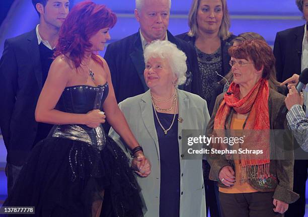 Singer Andrea Berg receives congratulations to her 45th birthday from her mother in law, Ingrid Ferber and mother Helga Zellen during the MDR...