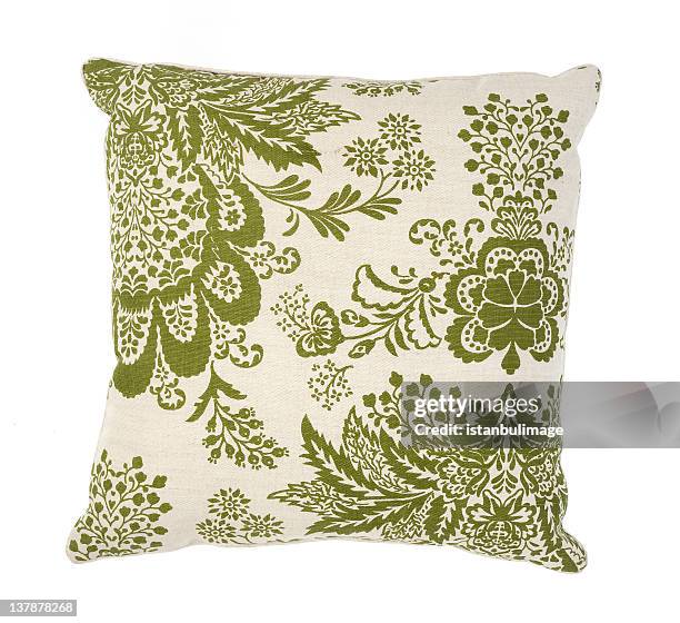 green and white couch pillow with a floral pattern - cushion stock pictures, royalty-free photos & images