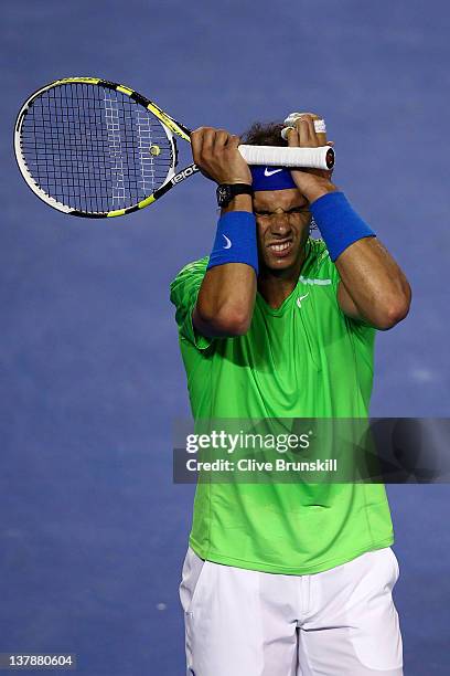 Rafael Nadal of Spain reacts in his men's final match against Novak Djokovic of Serbia during day fourteen of the 2012 Australian Open at Melbourne...