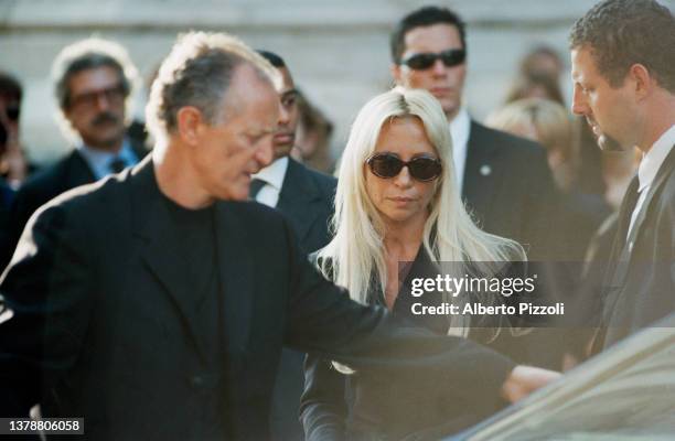 Santo and Donatella Versace attends the last tribute to Italian fashion designer Gianni Versace at Milan Cathedral . | Location: Milan Italy.