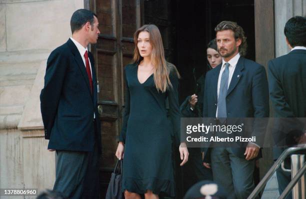 Carla Bruni attends the last tribute to Italian fashion designer Gianni Versace at Milan Cathedral . | Location: Milan Italy.