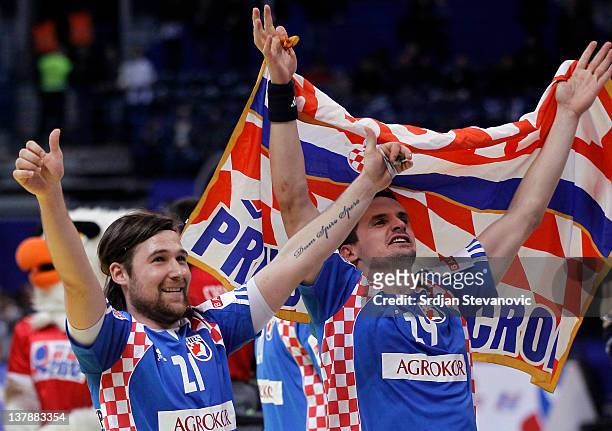 Ivan Cupic and Ivan Nincevic of Croatia celebrates victory against Spain during the Men's European Handball Championship 2012 Bronze medal match...