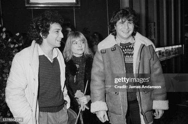 Michel Berger, France Gall and Daniel Balavoine attends premiere of movie "Tous Vedettes" in Paris.