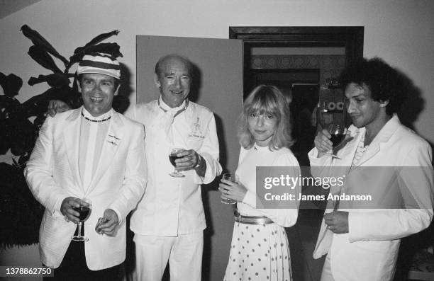 Le compositeur-auteur et interprète français Michel Berger avec la chanteuse française France Gall, le compositeur et chanteur britannique Elton John...