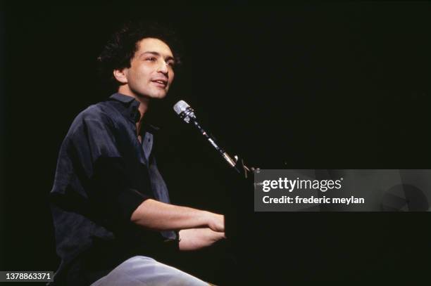 French singer and composer Michel Berger performs his first concert at the Zenith.