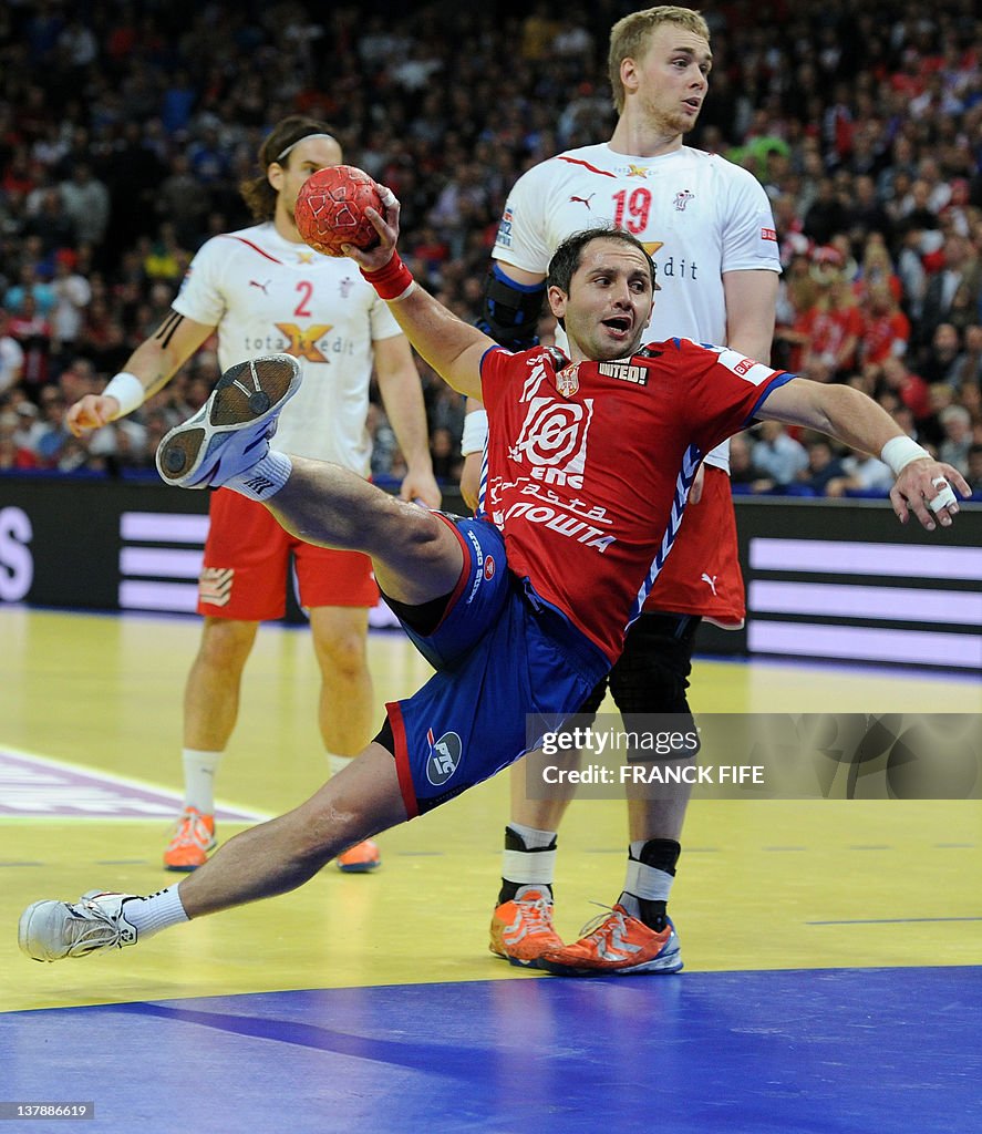 Serbia's Alem Toskic tries to score duri