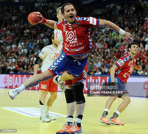Serbia's Alem Toskic jumps to score during the men's EHF Euro 2012 Handball Championship final Serbia vs Denmark on January 29, 2012 at the...