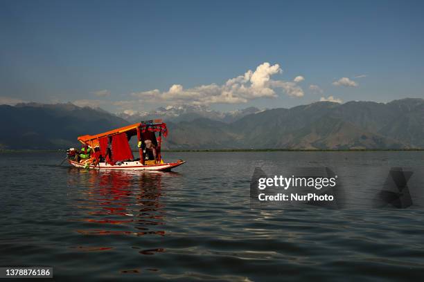 Tourists enjoying Shikara ride in Wular Lake in Bandipora Jammu and Kashmir India on 01 July 20223