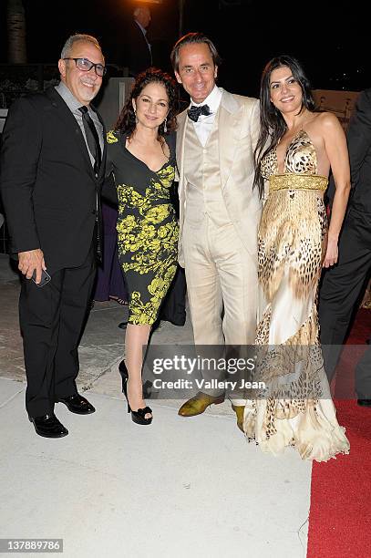 Emilio Estefan, Gloria Estefan, Frederic Marq and Adriana De Moura leaving the Bacardi 150th Anniversary Celebration on January 28, 2012 in Miami,...