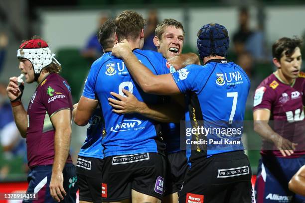 Kyle Godwin of the Force celebrates crossing for a try during the round three Super Rugby Pacific match between the Western Force and the Queensland...