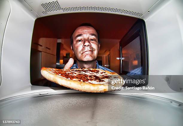 funny portrait of man - microwave oven stock pictures, royalty-free photos & images