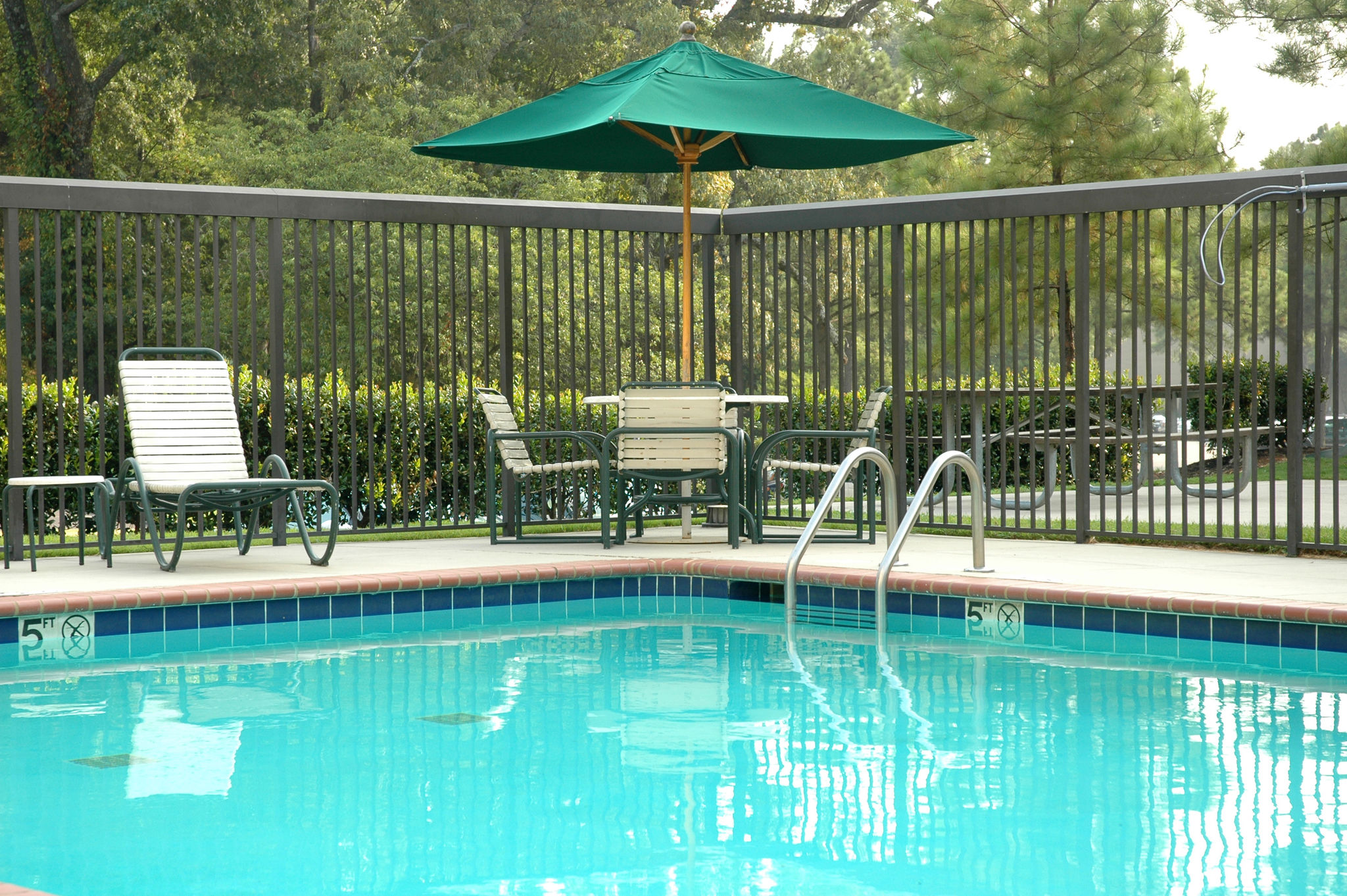 green fence pool