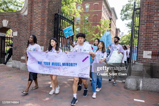 Students and others march through Harvard University in support of Affirmative Action after the Supreme Court ruling on July 1, 2023 in Cambridge,...