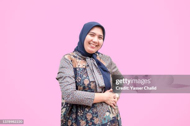 portrait of pregnant woman - fat asian woman stock-fotos und bilder