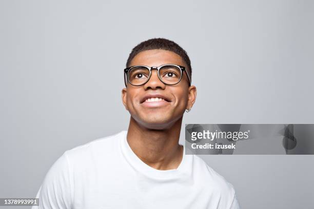 headshot of happy young man - happy face glasses stockfoto's en -beelden