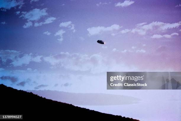 1980s Unidentified Flying Object Ufo In Hazy Sky Alien Saucer Space Ship Science Fiction Sci-Fi Suspicious Aerial Phenomenon.