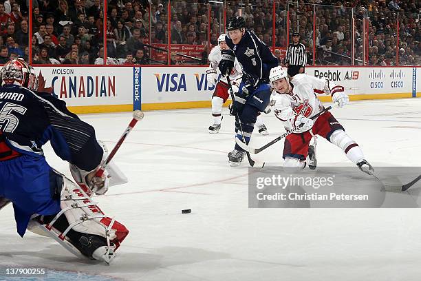 Steven Stamkos of the Tampa Bay Lightning and Team Alfredsson draws a penalty by Dion Phaneuf of the Toronto Maple Leafs in the first period during...