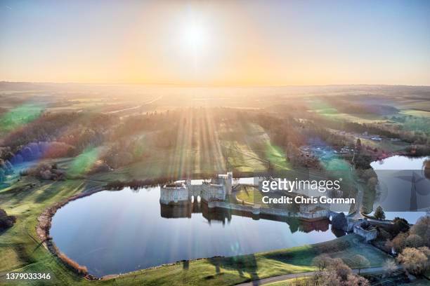 The sun rises behind Leeds Castle in Kent on February 25 2022 in Maidstone, United Kingdom.