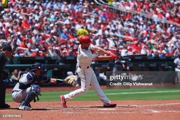 Paul DeJong of the St. Louis Cardinals hits an RBI single in the third inning of game one against the New York Yankees at Busch Stadium on July 1,...