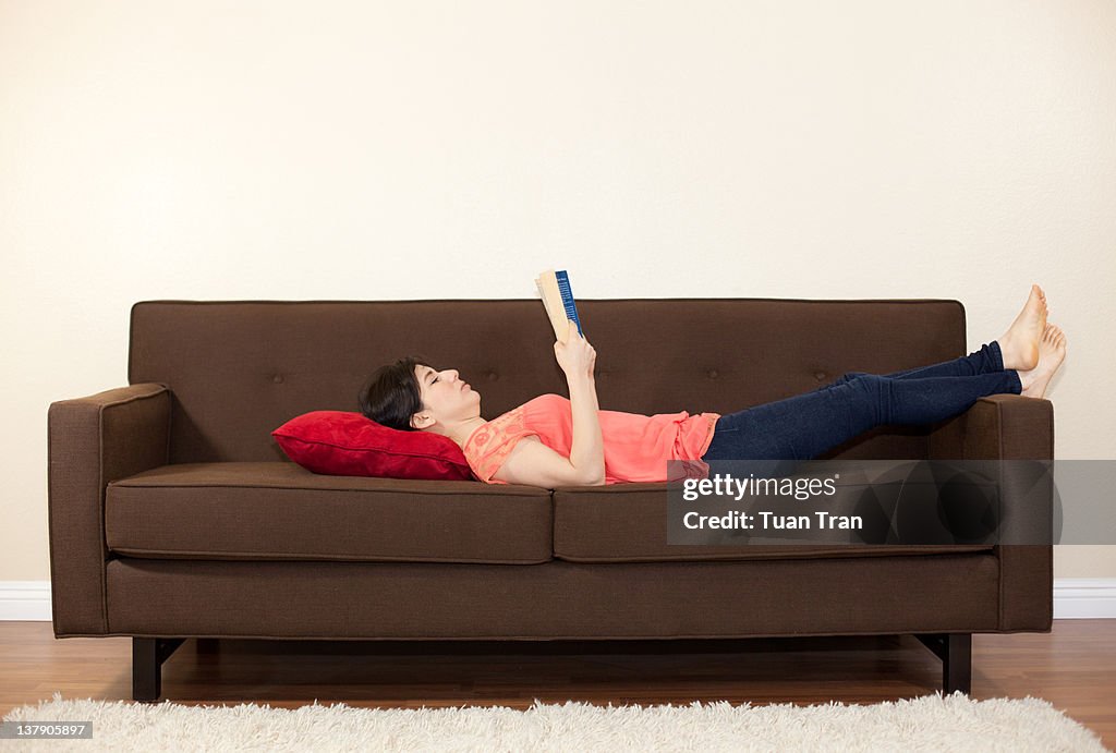 Girl laying on sofa