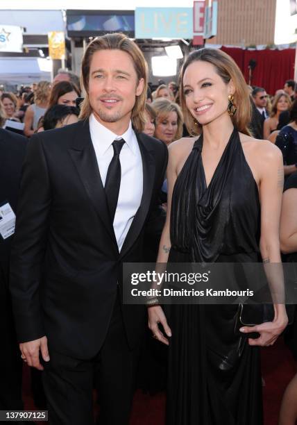 Actors Brad Pitt and Angelina Jolie attend The 18th Annual Screen Actors Guild Awards broadcast on TNT/TBS at The Shrine Auditorium on January 29,...