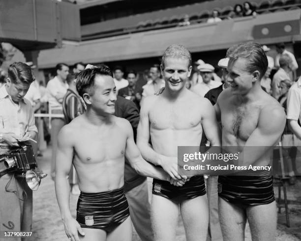 American 3 metre springboard divers Sammy Lee, Bruce Harlan and Miller Anderson at the Empire Pool, Wembley during the Olympic Games in London, 31st...