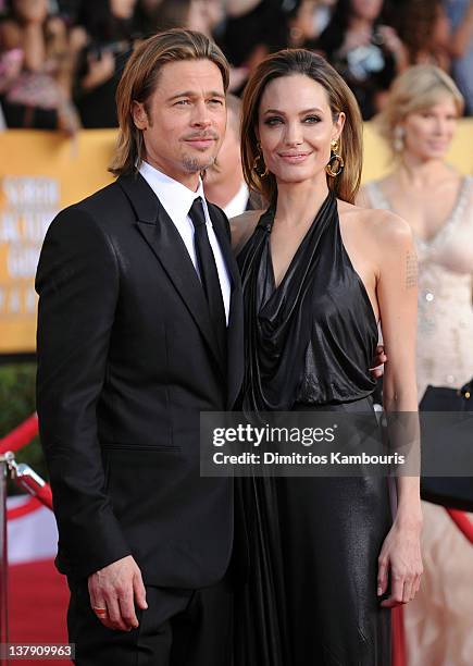 Actors Brad Pitt and Angelina Jolie attend The 18th Annual Screen Actors Guild Awards broadcast on TNT/TBS at The Shrine Auditorium on January 29,...