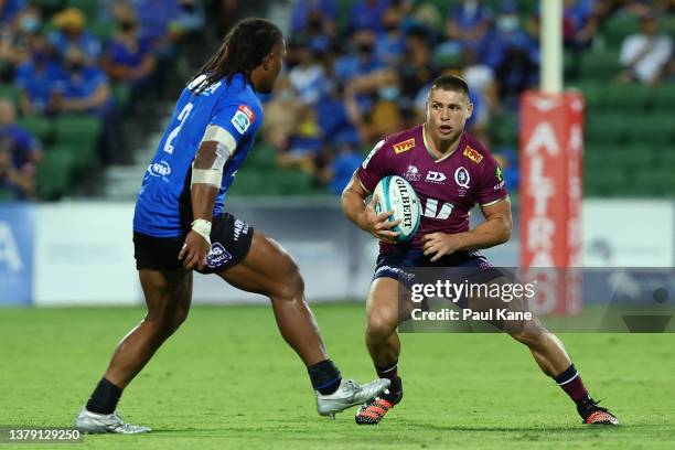 James O'Connor of the Reds runs the ball during the round three Super Rugby Pacific match between the Western Force and the Queensland Reds at HBF...