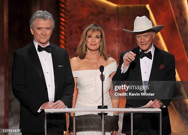 Actors Patrick Duffy, Linda Gray, and Larry Hagman speak onstage during the 18th Annual Screen Actors Guild Awards at The Shrine Auditorium on...
