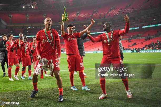 Joel Matip, Luis Diaz and Ibrahima Konate celebrate after the Carabao Cup Final match between Chelsea and Liverpool at Wembley Stadium on February...