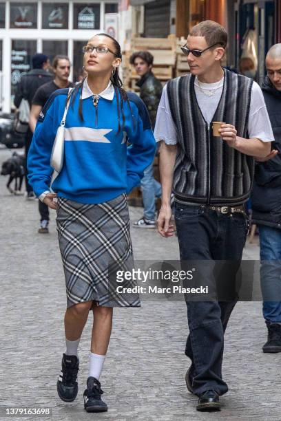 Model Bella Hadid and Marc Kalman are seen on March 04, 2022 in Paris, France.