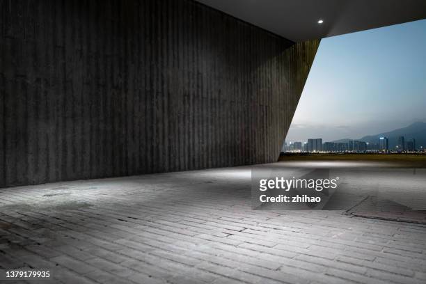 night view of empty space with concrete walls - empty driveway stock pictures, royalty-free photos & images