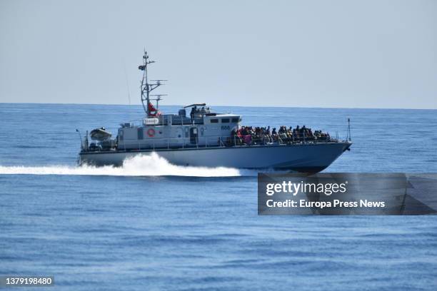 Libyan patrol boat with migrants intercepted as they left the coast of Libya in a boat, on March 4 off the coast of Libya, in international waters,...