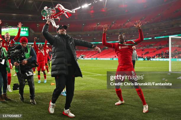 Liverpool manager Jurgen Klopp celebrates with the trophy following the Carabao Cup Final match between Chelsea and Liverpool at Wembley Stadium on...