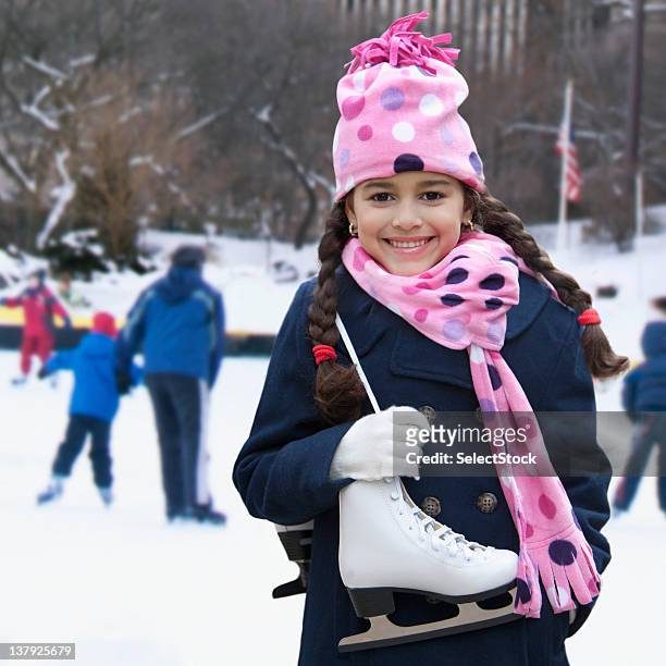 girl getting ready to go ice skating - hockey skate stock pictures, royalty-free photos & images