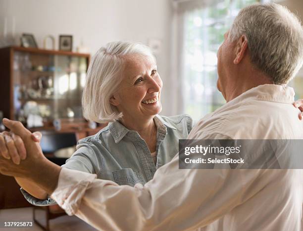 smiling older couple dancing - old woman dancing bildbanksfoton och bilder
